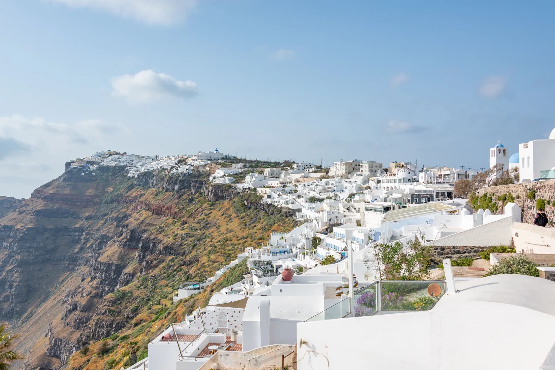 BookNoFees sample image: White houses on the steep slopes of Santorini