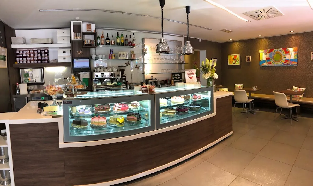 BookNoFees: Café – Kavarna Čopomana – Ljubljana – Čopomana Café, photo 1
